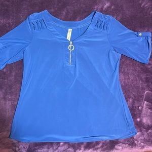 Women’s beautiful blouse and royal blue.